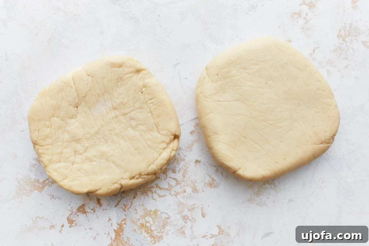 The Ultimate Gluten-Free Chicken Pot Pie 7 2 gluten-free pie crust doughs flattened on a light countertop