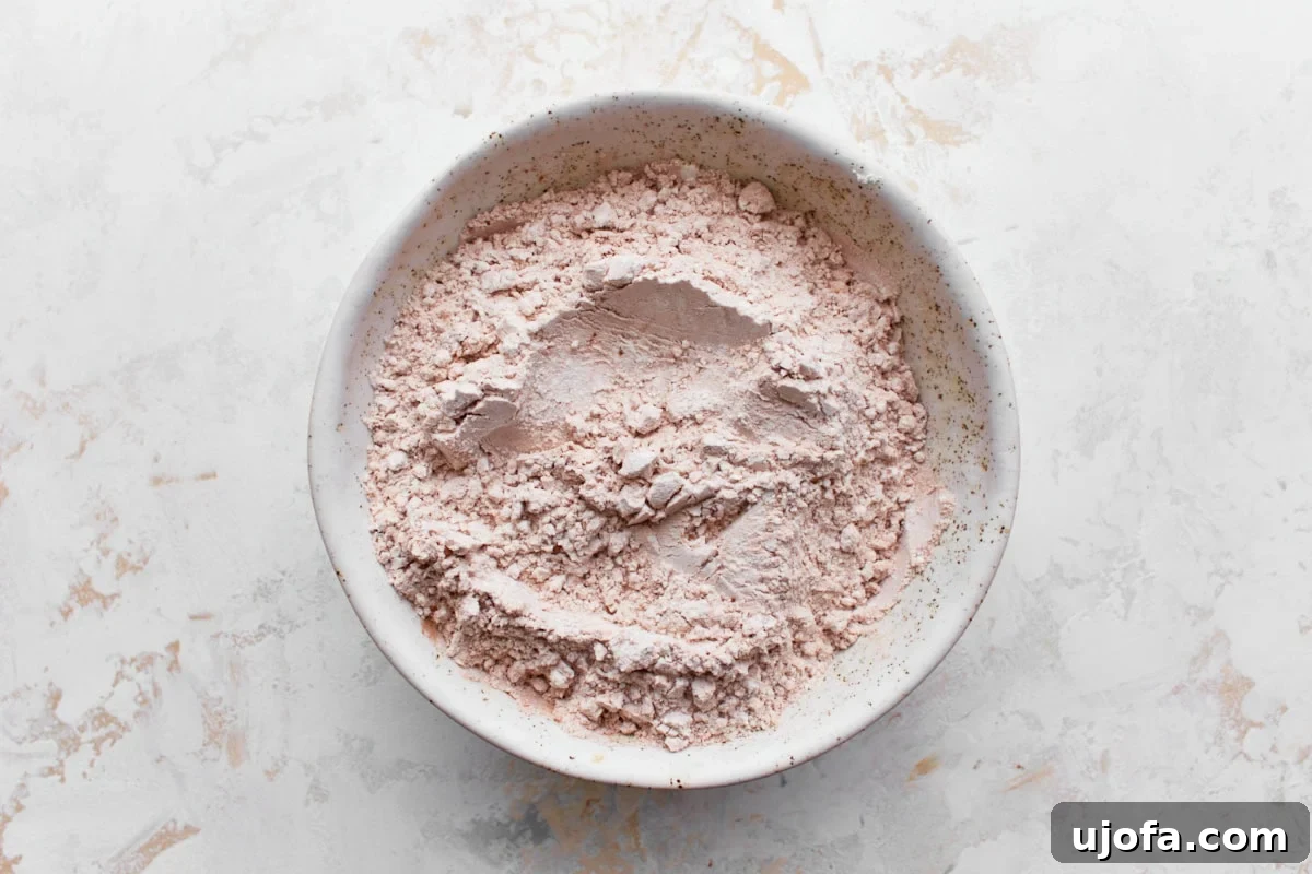 gluten-free flour and cocoa powder mixture in a white bowl