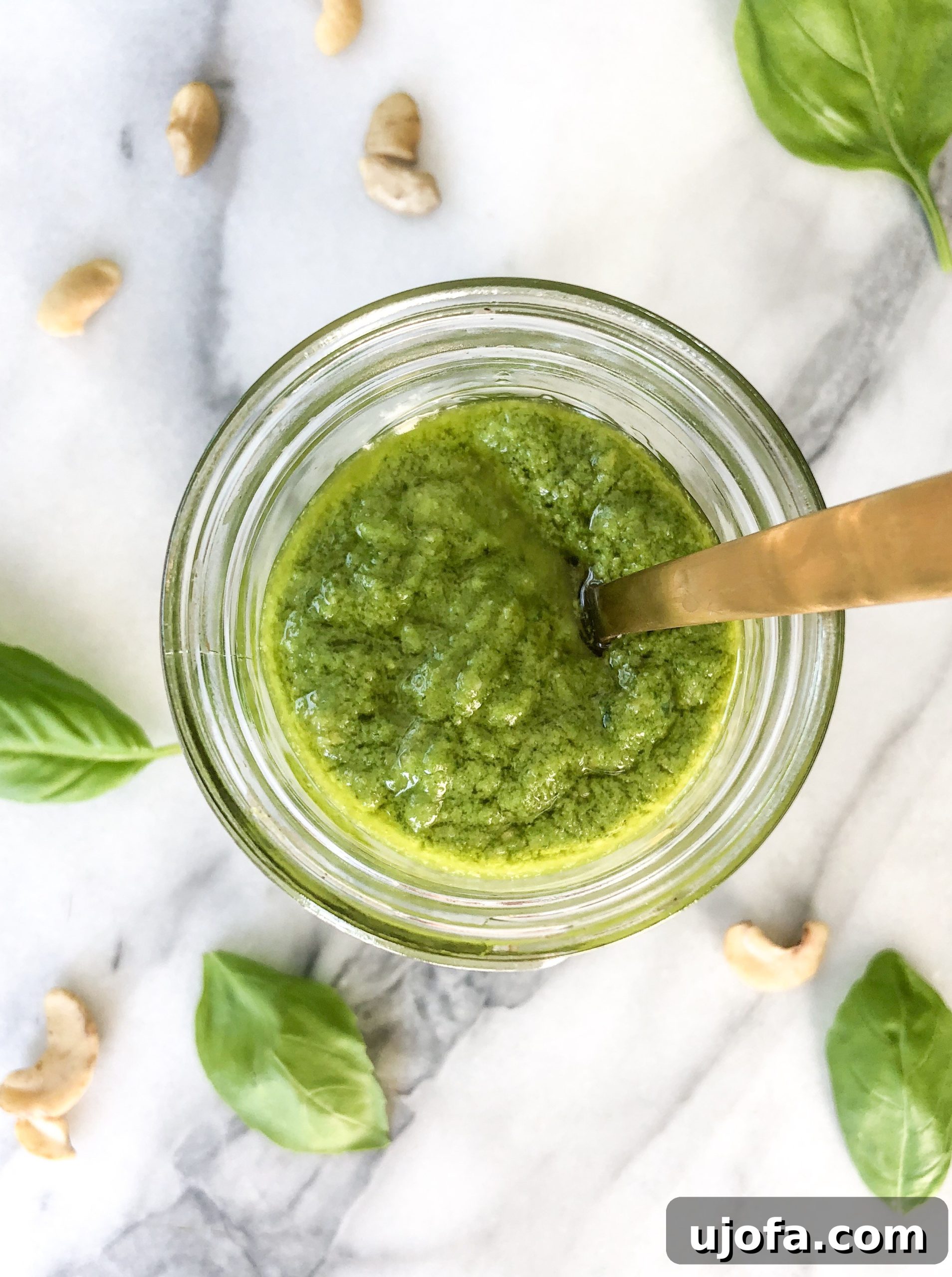 A vibrant close-up of Cashew Pesto, highlighting its rich texture and color.