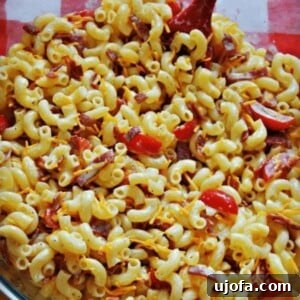 Creamy Gluten-Free Bacon, Tomato, and Cheese Macaroni Salad 6 Gluten-free macaroni salad in a glass bowl