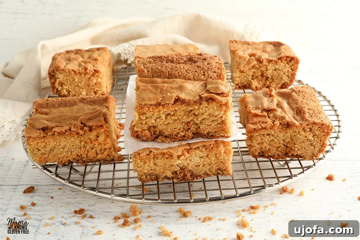 Gluten-free blondies cooling on a wire rack, golden brown and perfectly baked