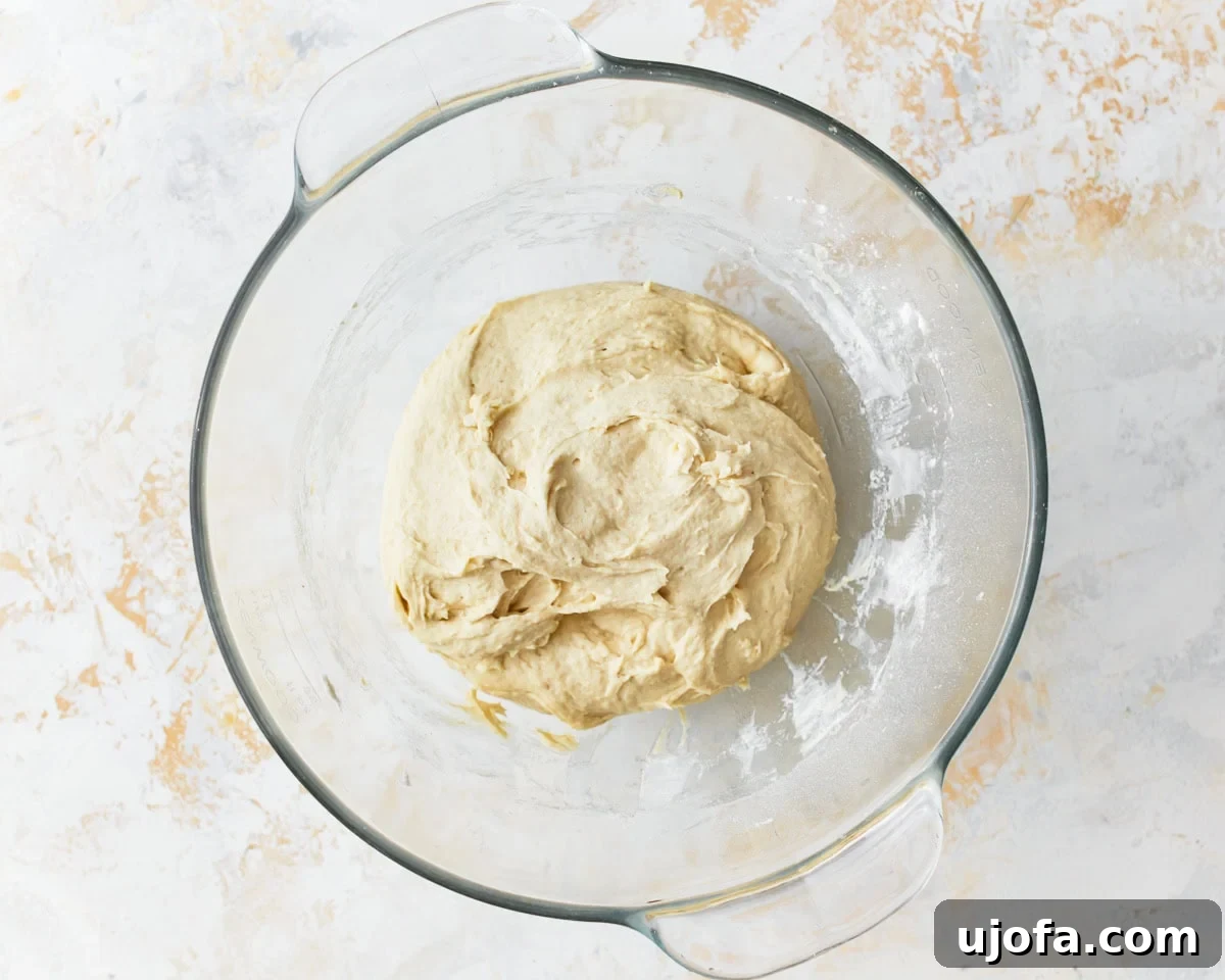 Artisan Gluten-Free Focaccia 7 gluten-free focaccia dough in a glass bowl.