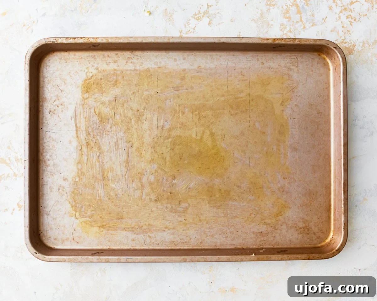 Artisan Gluten-Free Focaccia 10 an oiled baking sheet.