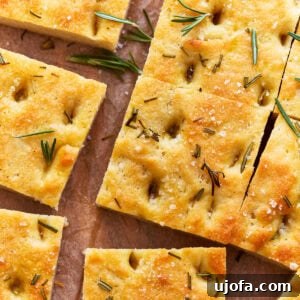 Artisan Gluten-Free Focaccia 16 overhead view of cut gluten-free focaccia.