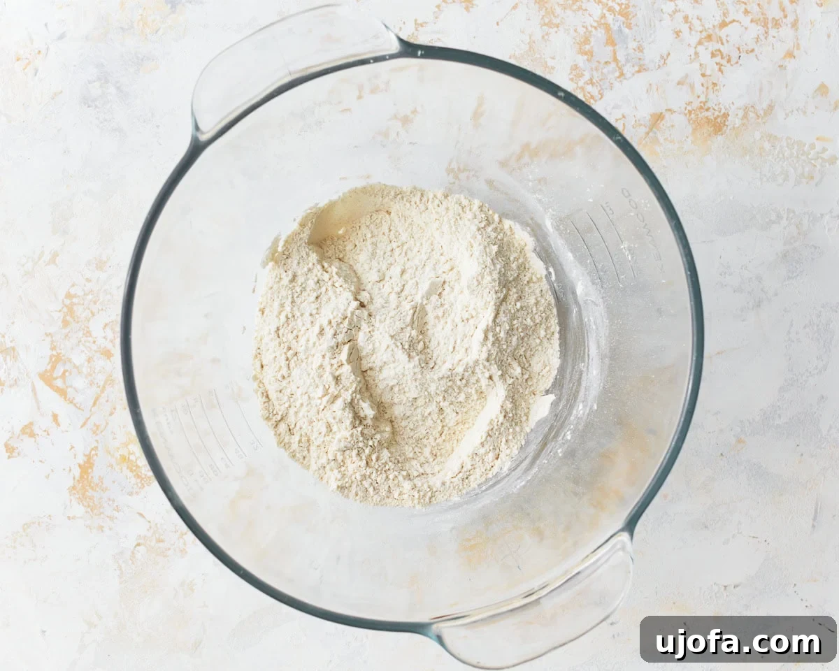 Artisan Gluten-Free Focaccia 4 dry ingredients for gluten-free focaccia in a glass bowl.