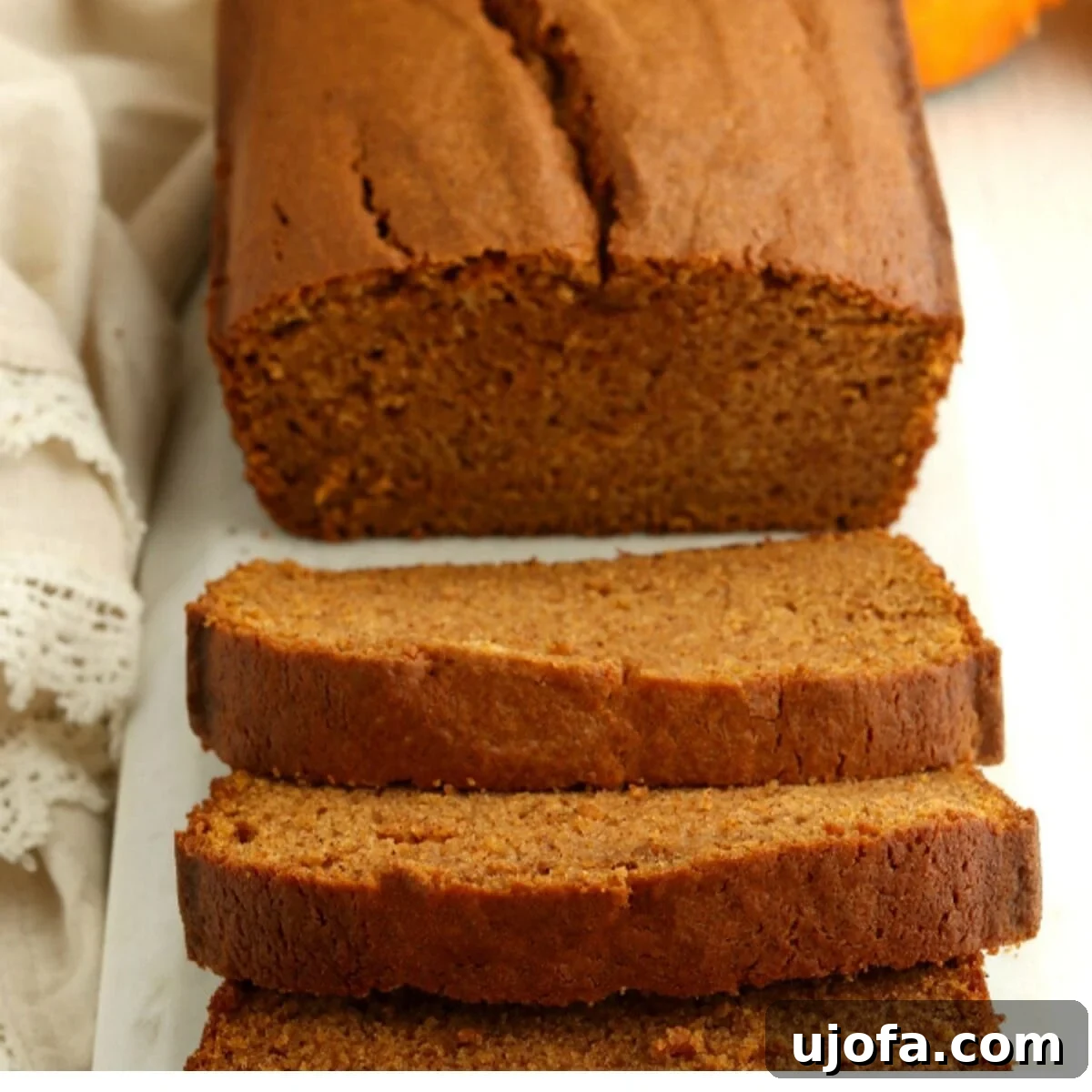 sliced loaf of gluten-free pumpkin bread