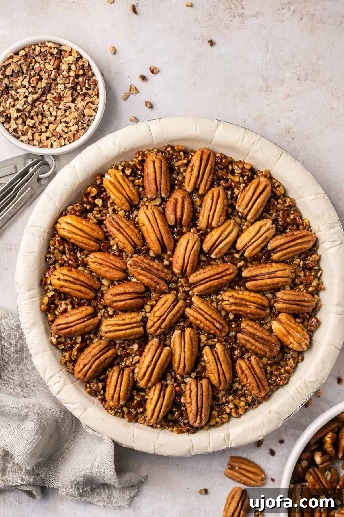 Pure Delight Gluten-Free Dairy-Free Pecan Pie No Corn Syrup 5 An inviting overhead shot of a freshly baked gluten-free pecan pie, showing its rich, set filling and golden crust.
