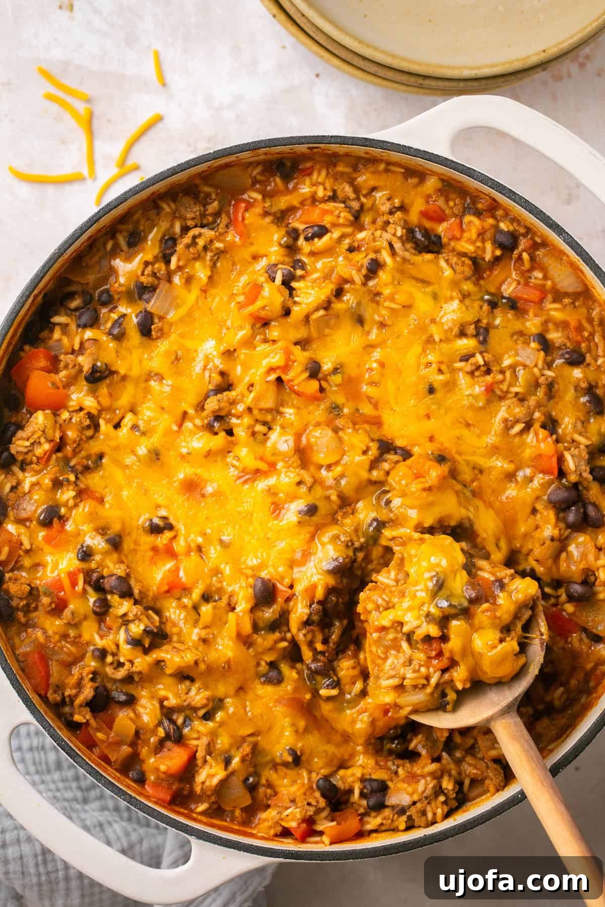 An overhead shot of a delicious beef taco in a bowl recipe simmering in a deep skillet, ready to be served.