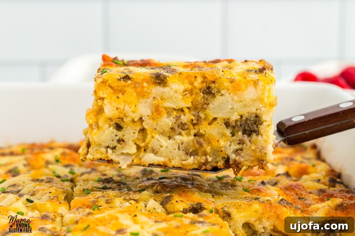 Gluten Free Brunch Delights 43 A hearty, golden-brown gluten-free breakfast casserole, generously filled with eggs, sausage, and cheese, baked to perfection in a rectangular dish.