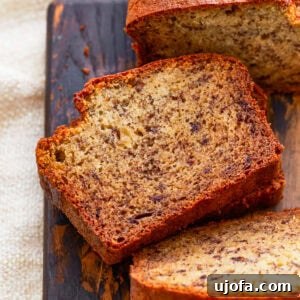 Gluten Free Brunch Delights 52 A delightful close-up of a perfectly baked slice of gluten-free banana bread, revealing its moist texture and rich banana flavor.