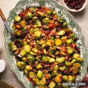 maple bacon brussels sprouts with pecans on a platter