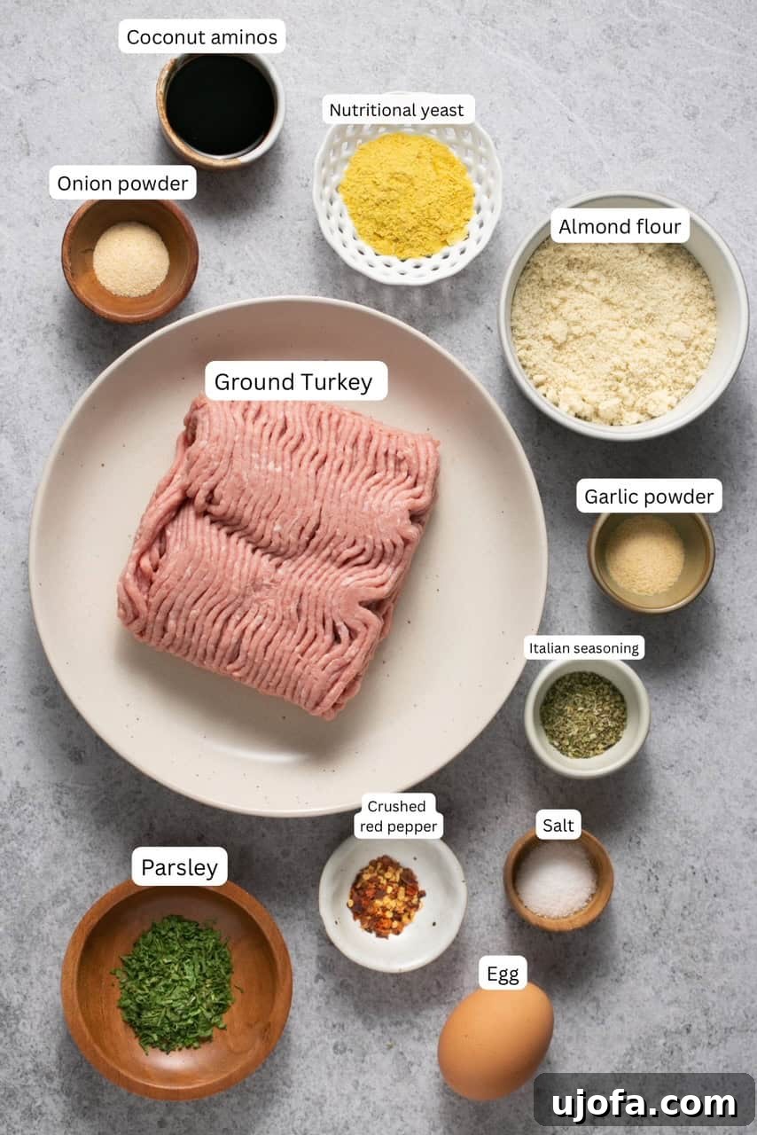 ingredients for gluten free turkey meatballs in nesting bowls and on a plate