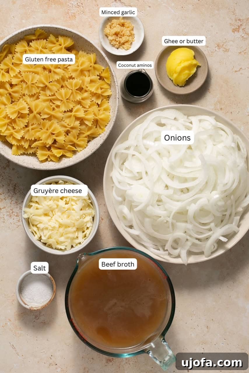 TikTok's Must-Try Gluten-Free French Onion Pasta 3 Individual bowls containing fresh ingredients like sliced onions, minced garlic, and butter for the French onion pasta recipe.