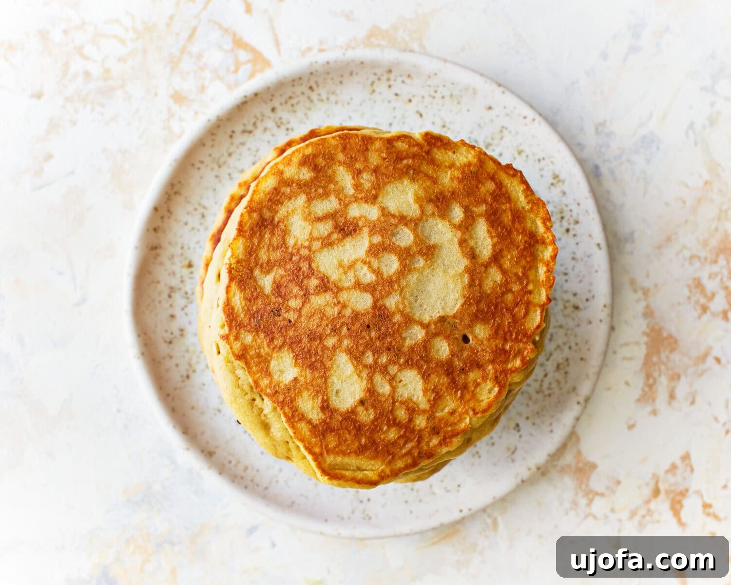 Fluffy Almond Pancakes 10 A plate of almond flour pancakes.