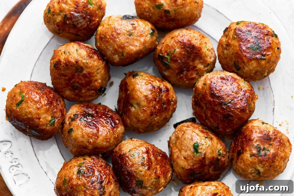 Delicious Gluten-Free Turkey Meatballs 4 Close up of gluten free turkey meatballs on a plate.