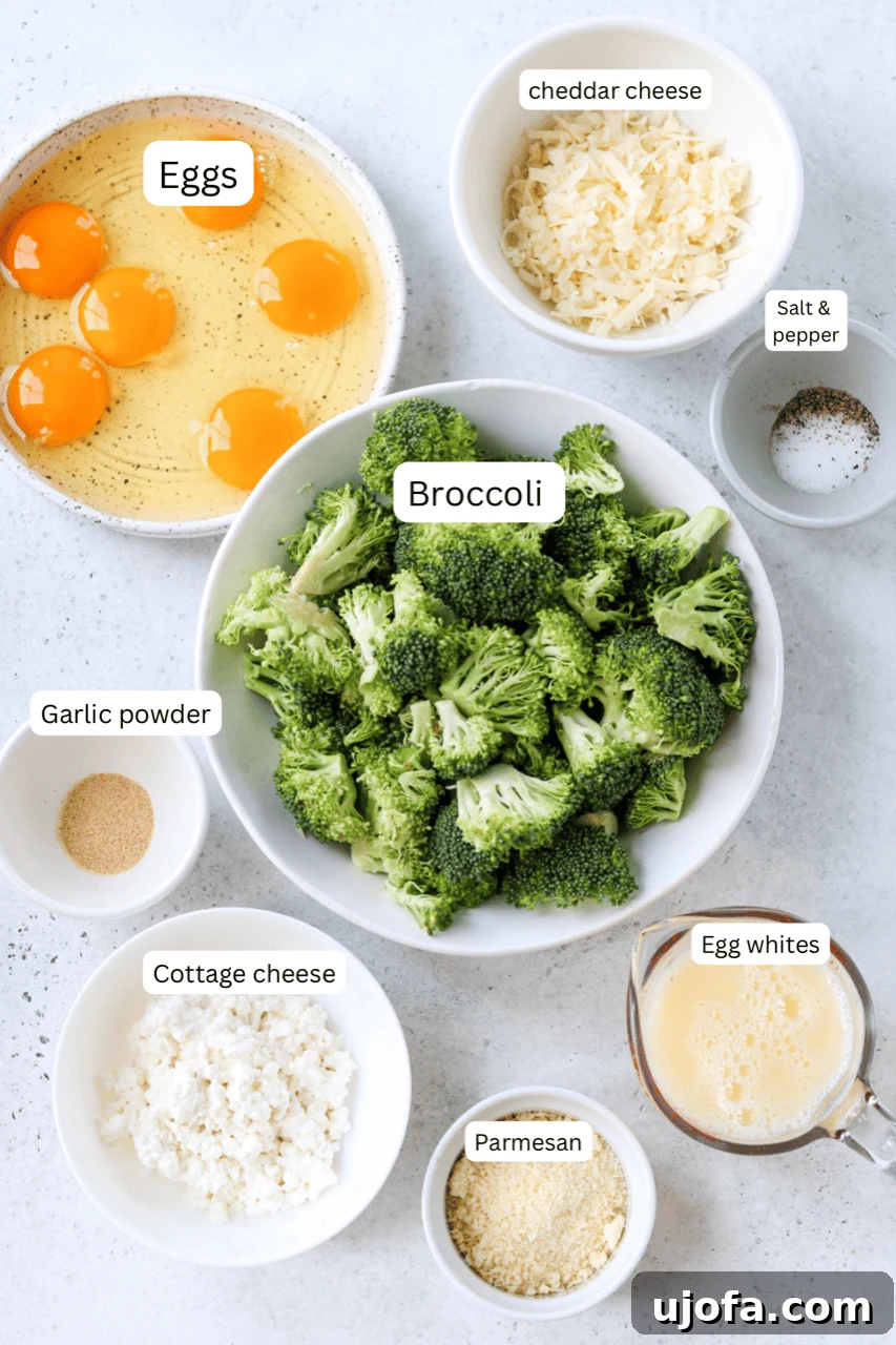 Keto Cheesy Broccoli Egg Muffins 3 Ingredients for broccoli cheese egg bites laid out in small nesting bowls, including eggs, cottage cheese, broccoli, and various cheeses