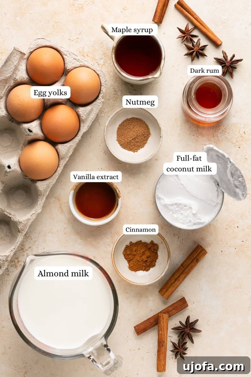 Plant-Based Eggnog 8 A curated selection of fresh ingredients laid out, ready for making dairy-free eggnog, emphasizing natural components.