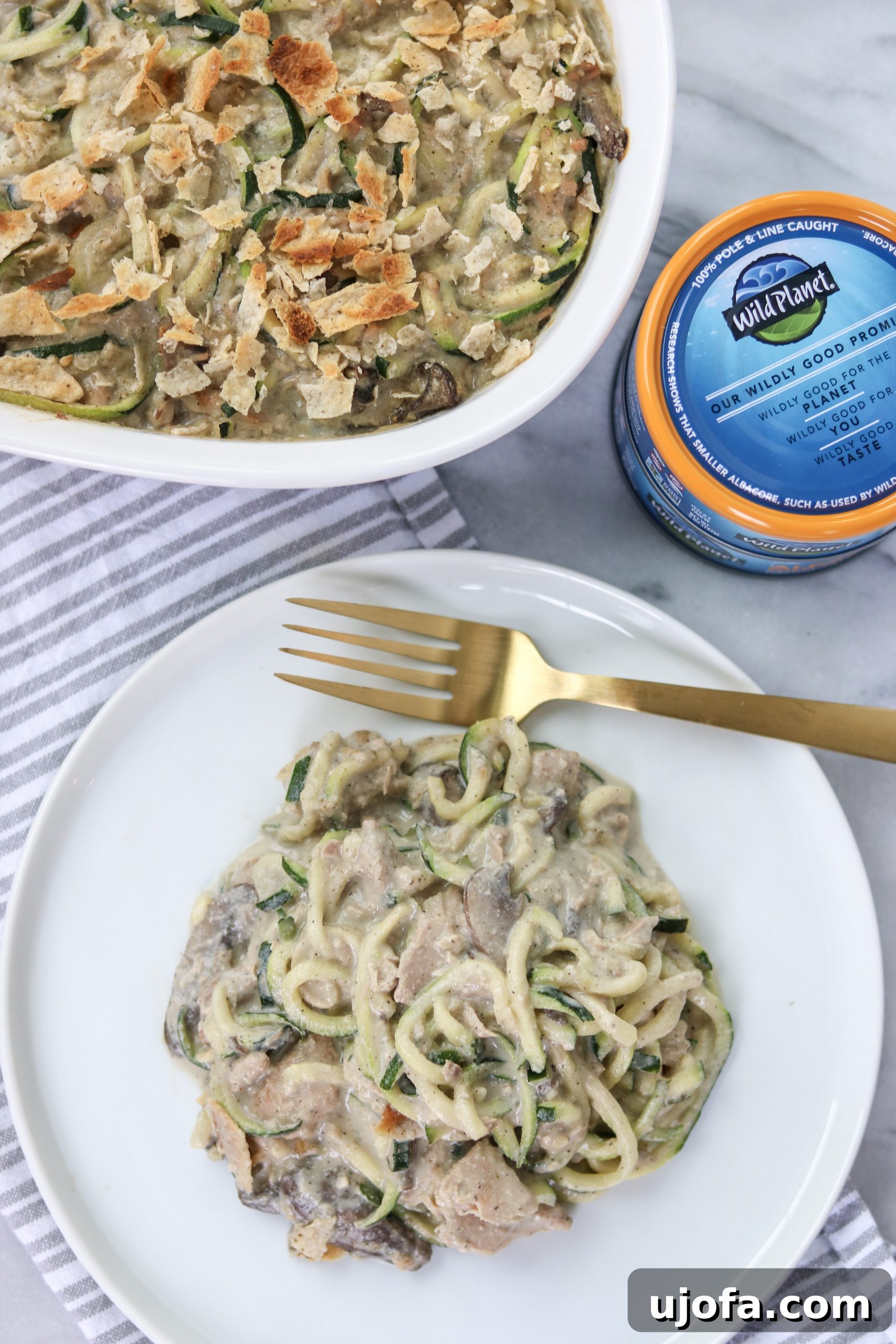 Tuna Zoodle Casserole baking in a casserole dish, topped with grain-free chips