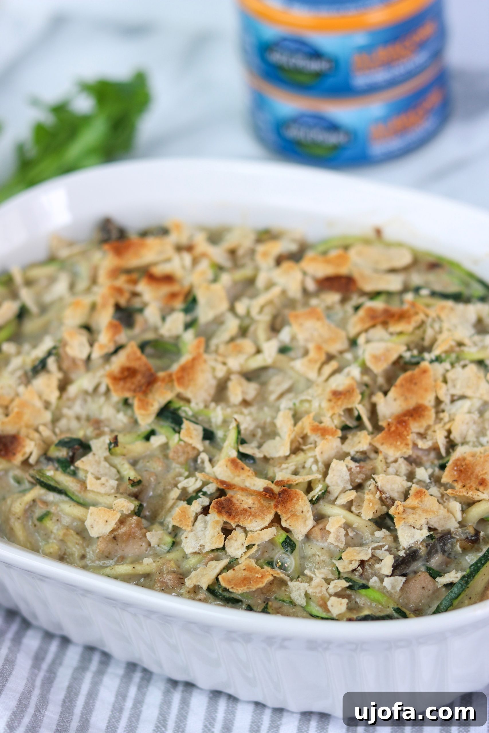 Serving of Tuna Zoodle Casserole on a plate, showing the creamy texture