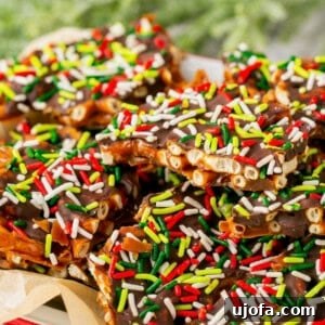 Pretzel Christmas Crack on a plate with parchment paper, serving suggestion