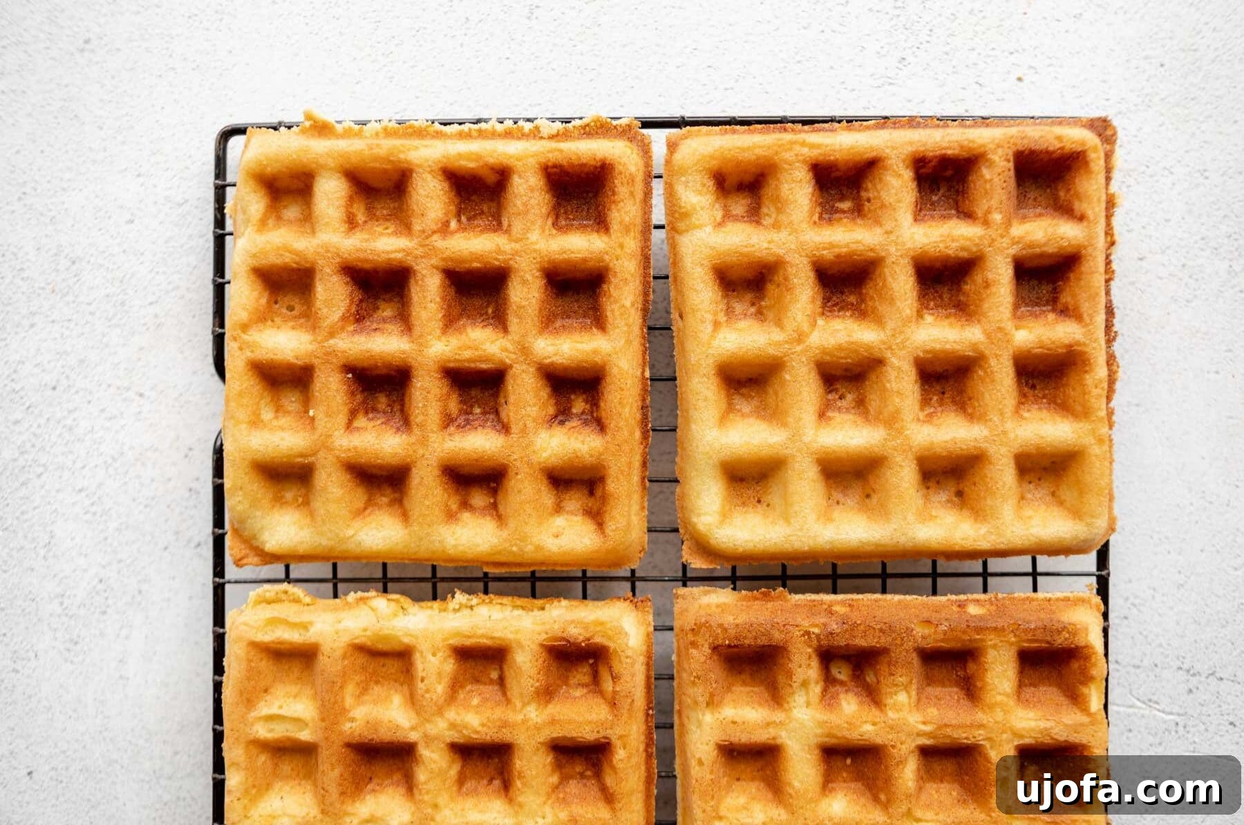 Almond Cloud Waffles 9 Almond flour waffles on a cooling rack