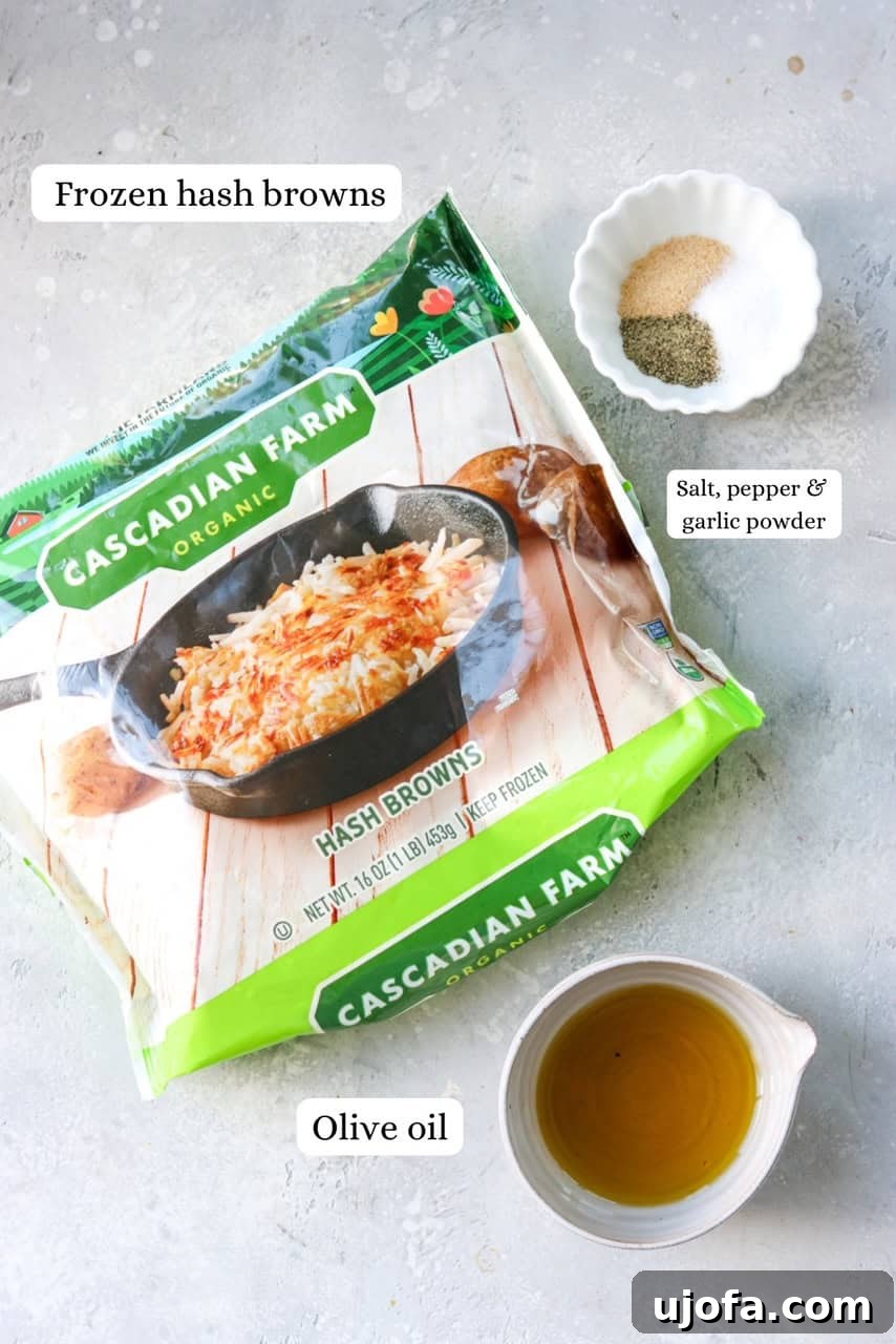 ingredients needed for air fryer frozen hash browns, including potatoes, oil, and spices