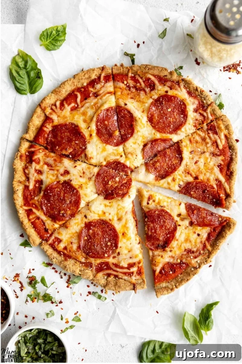 Crispy Gluten-Free Almond Flour Pizza Crust 5 A whole pepperoni pizza, baked to perfection on a Gluten-Free Almond Flour Pizza Crust, sliced and ready to serve.