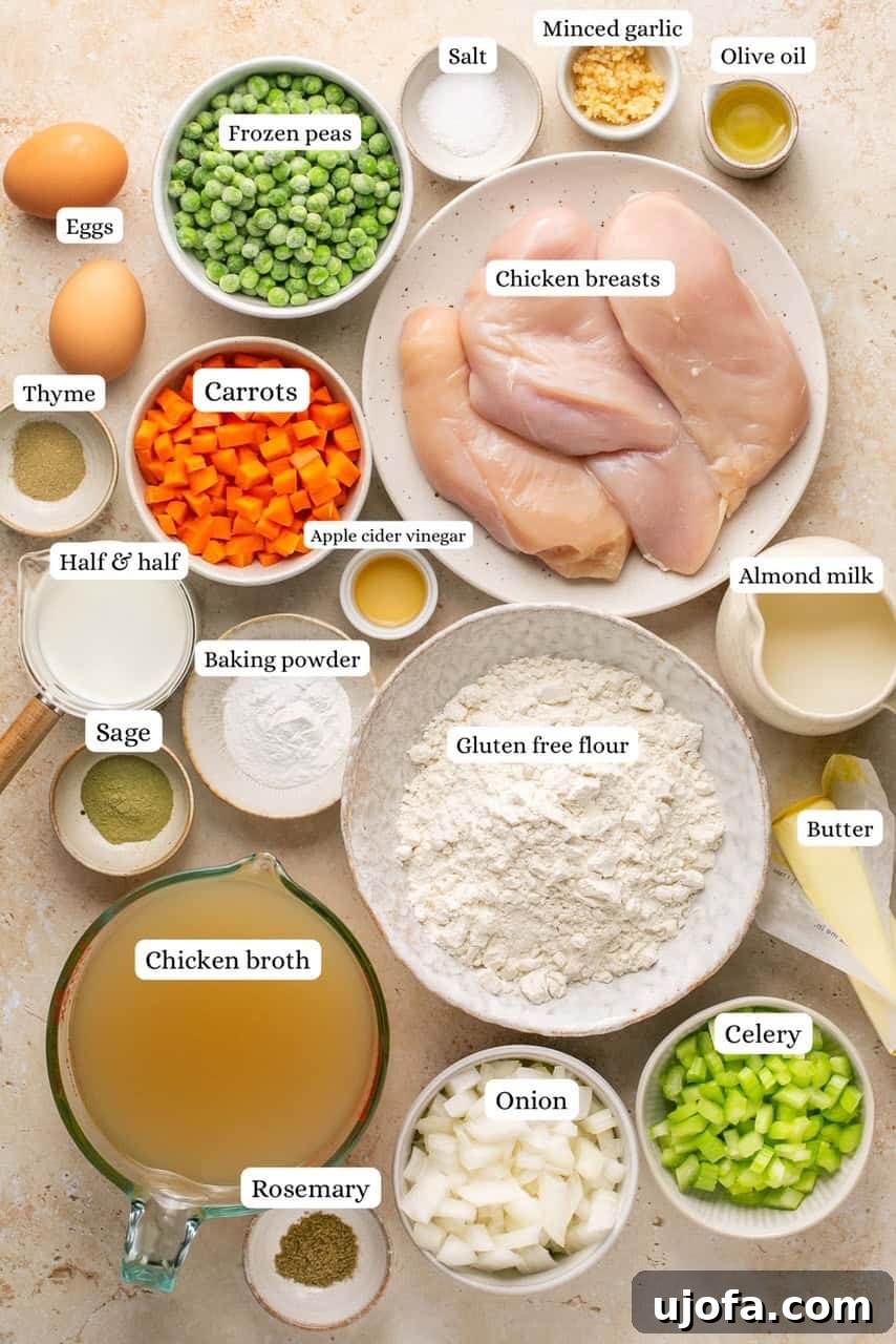 Effortless Gluten-Free Chicken and Dumplings 3 A vibrant selection of fresh ingredients including chicken, vegetables, and flour, laid out for a gluten-free chicken and dumplings recipe.