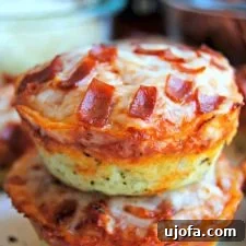 Gluten-free pizza bites, freshly baked and ready to be served, showcasing their deep dish crust and melted cheese.
