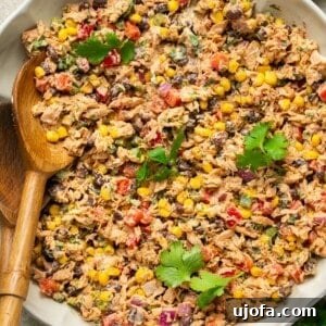 Mexican Tuna Salad in a bowl with a serving spoon