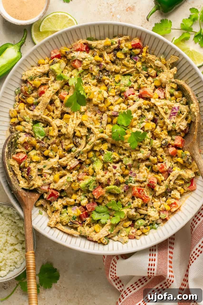 A perfectly tossed Mexican chicken salad in a serving bowl, ready to be enjoyed.