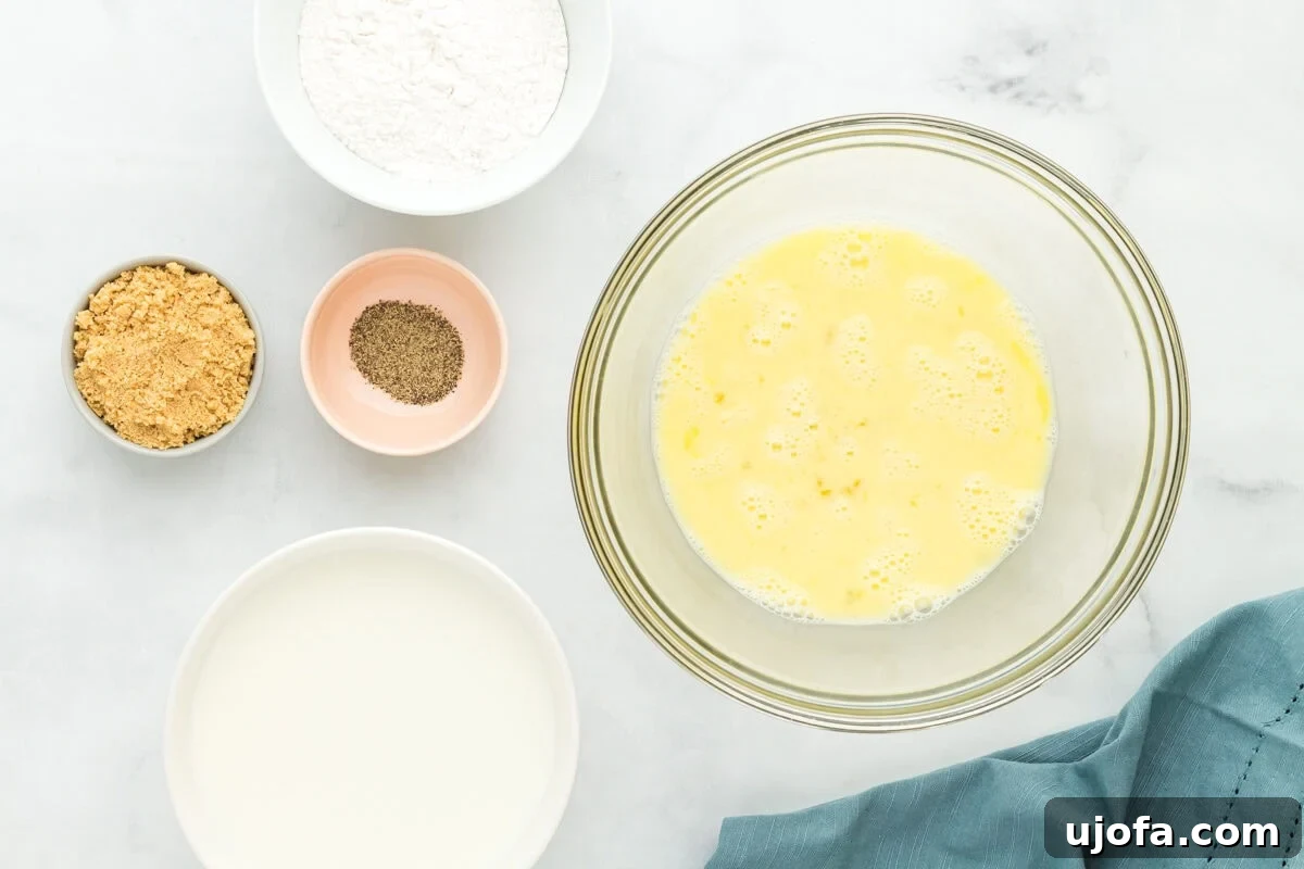 whisked eggs in a glass bowl.
