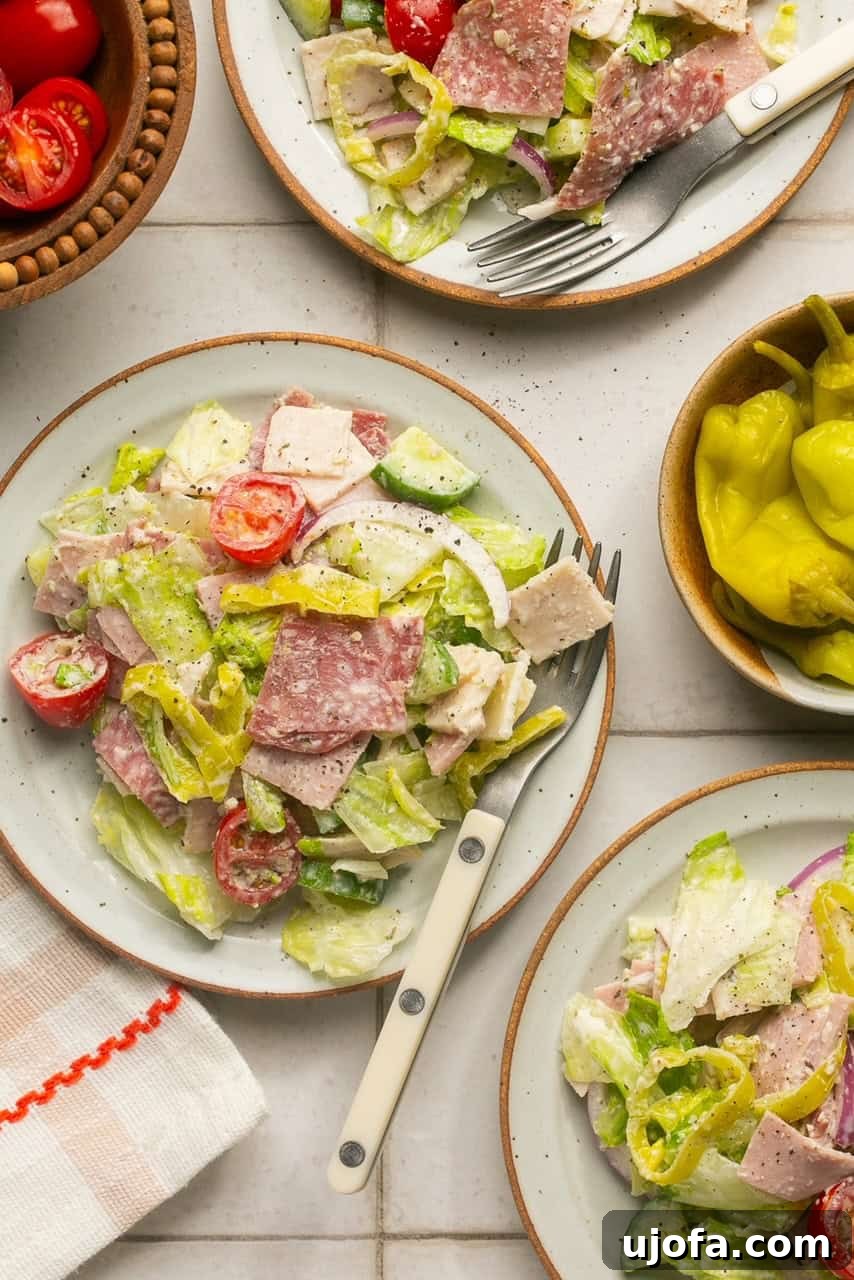 individual salads served on white plates