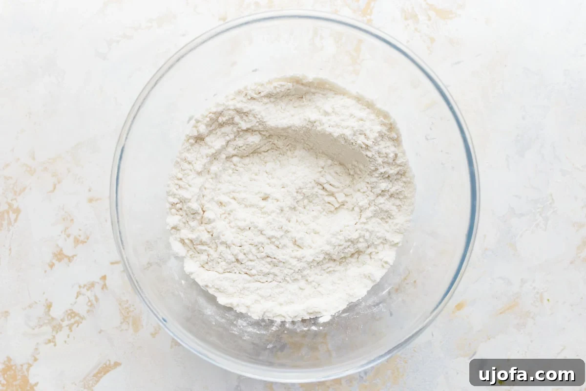 Fluffy Gluten Free Gnocchi 11 gluten free flour blend in a white bowl.