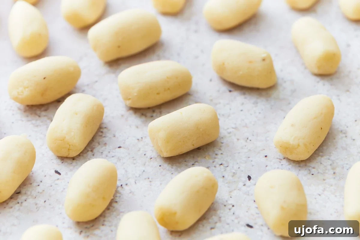 Fluffy Gluten Free Gnocchi 13 dough cut into smooth pieces.