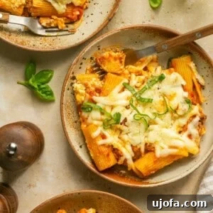 Lazy lasagna baked ziti in bowls, a hearty and easy meal.
