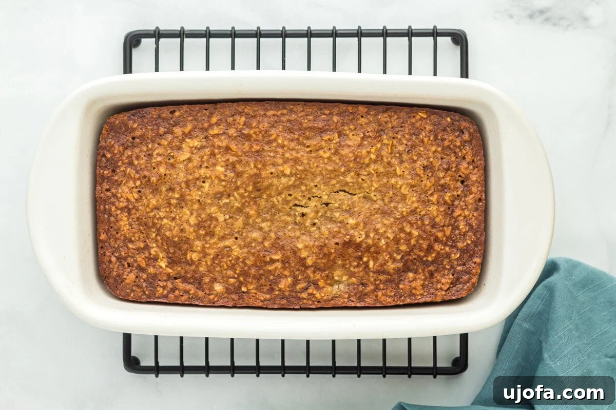 Wholesome Banana Bliss 10 Baked flourless banana bread cooling in a baking dish after being removed from the oven.