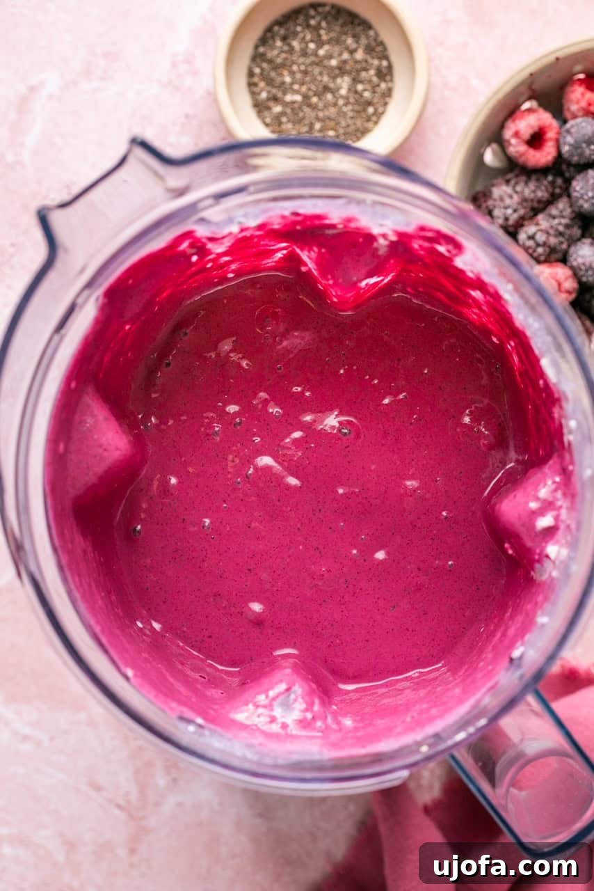 The blended smoothie resting in the blender container, showing its smooth and creamy consistency.