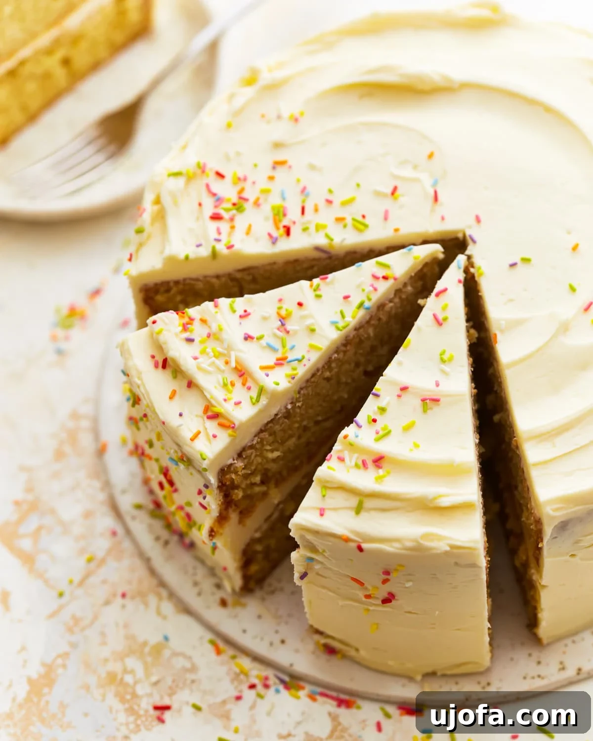 Delicious Gluten-Free Cake Delights 5 partially sliced gluten-free vanilla cake.