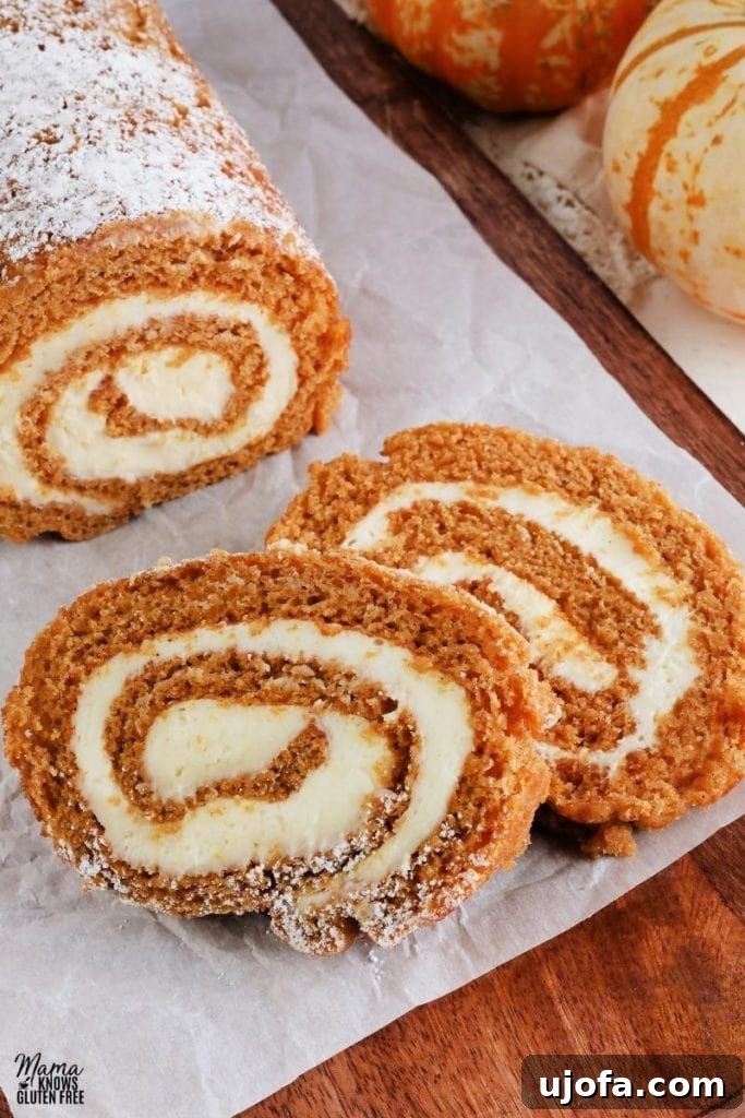Delicious Gluten-Free Cake Delights 8 gluten-free pumpkin roll sliced on a brown cutting board