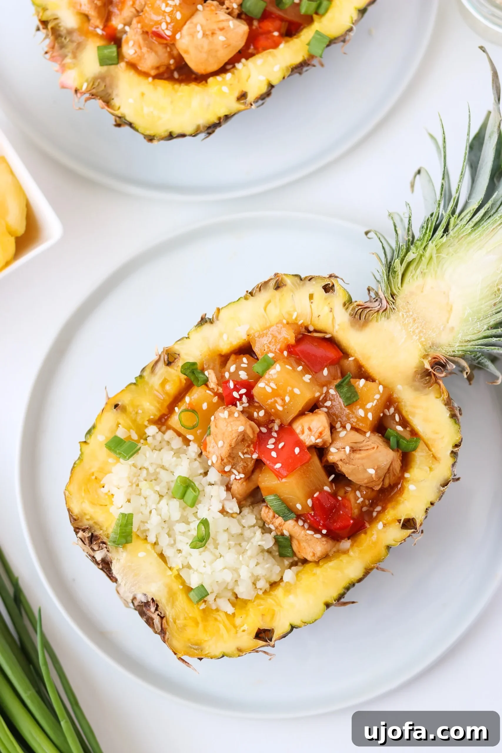 Whole30 Instant Pot Hawaiian Chicken served elegantly in a pineapple bowl