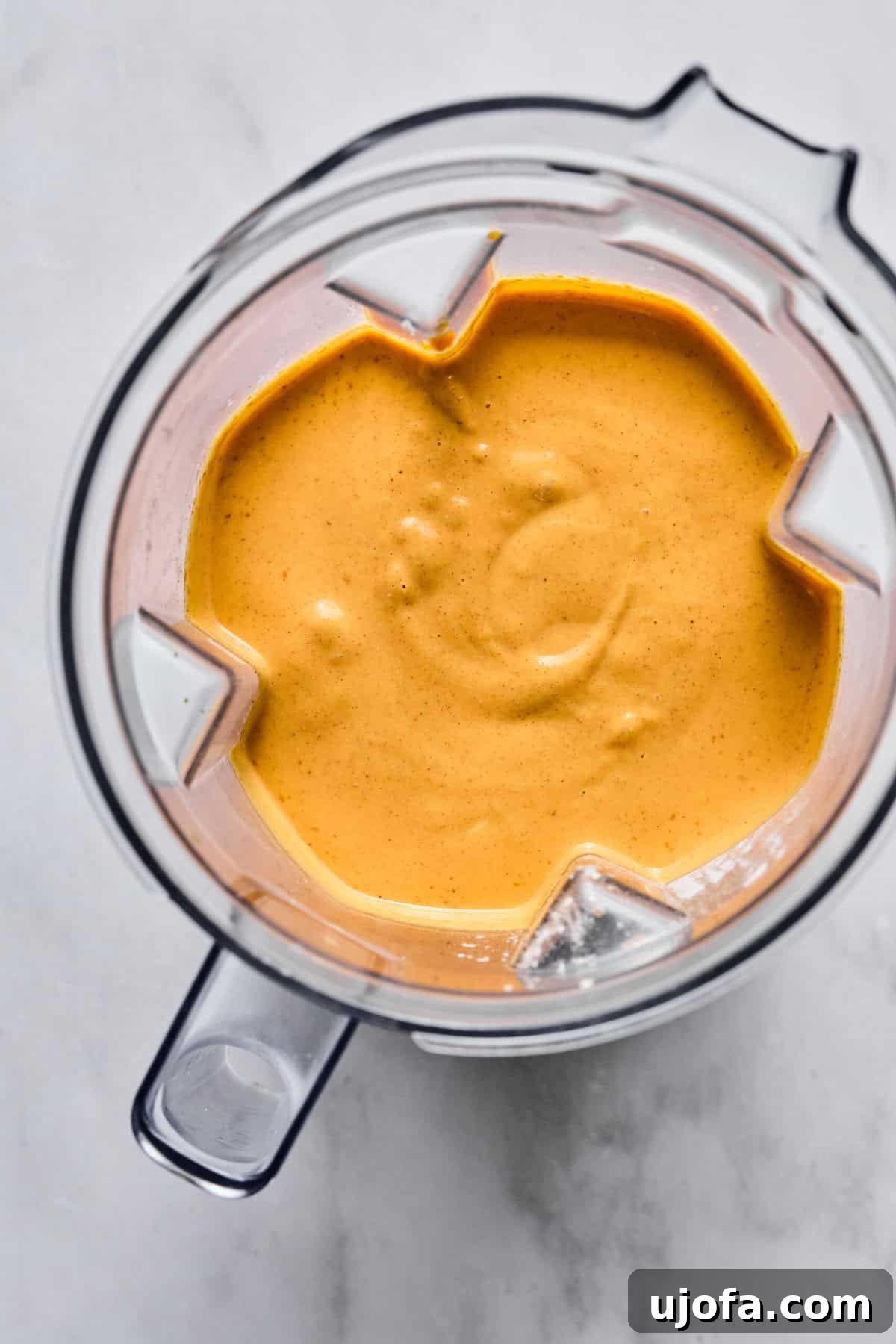 Easy Protein-Packed Pumpkin Cheesecake Bars 7 pumpkin cheesecake filling in a blender