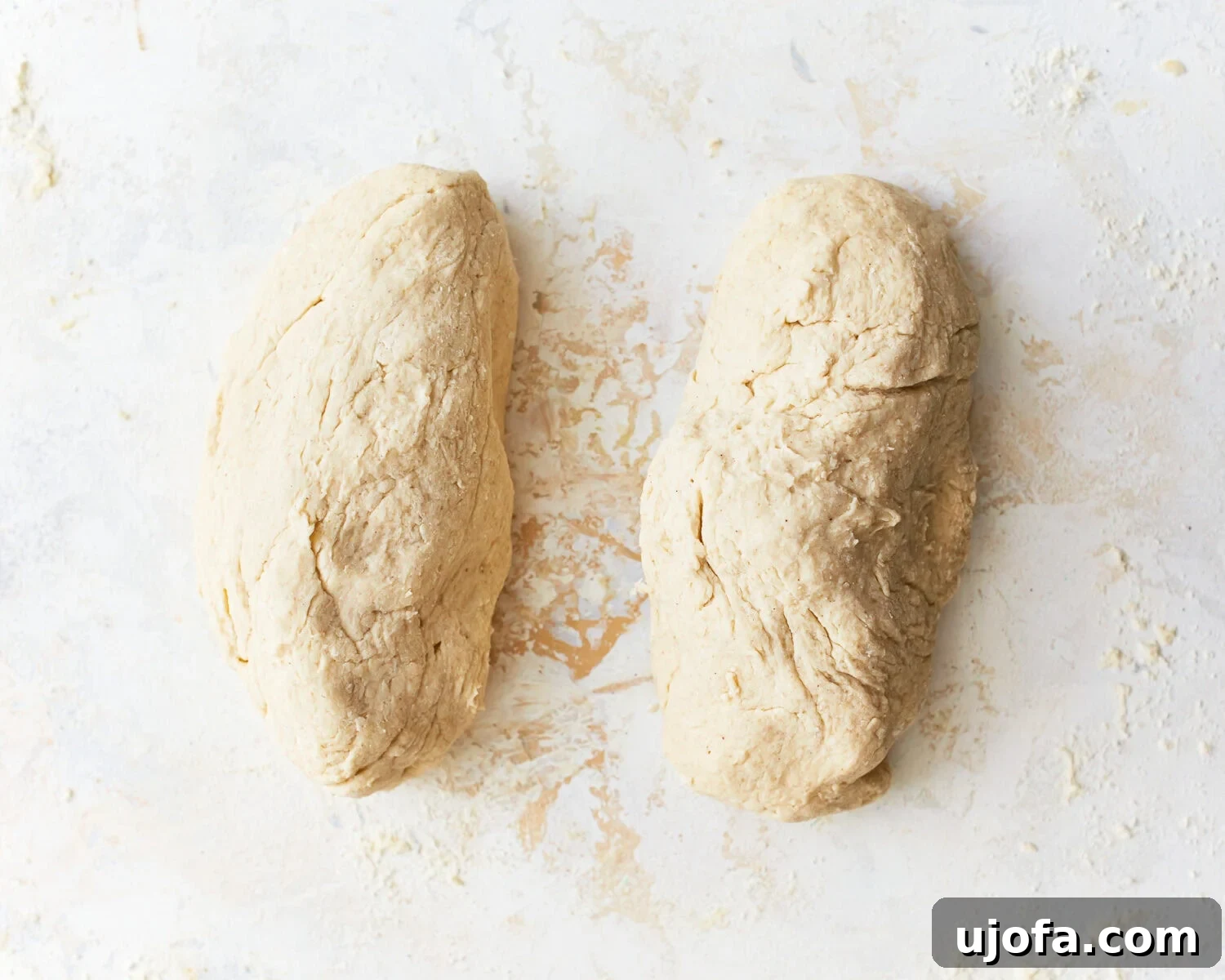 Gluten-free baguette dough split in two pieces.