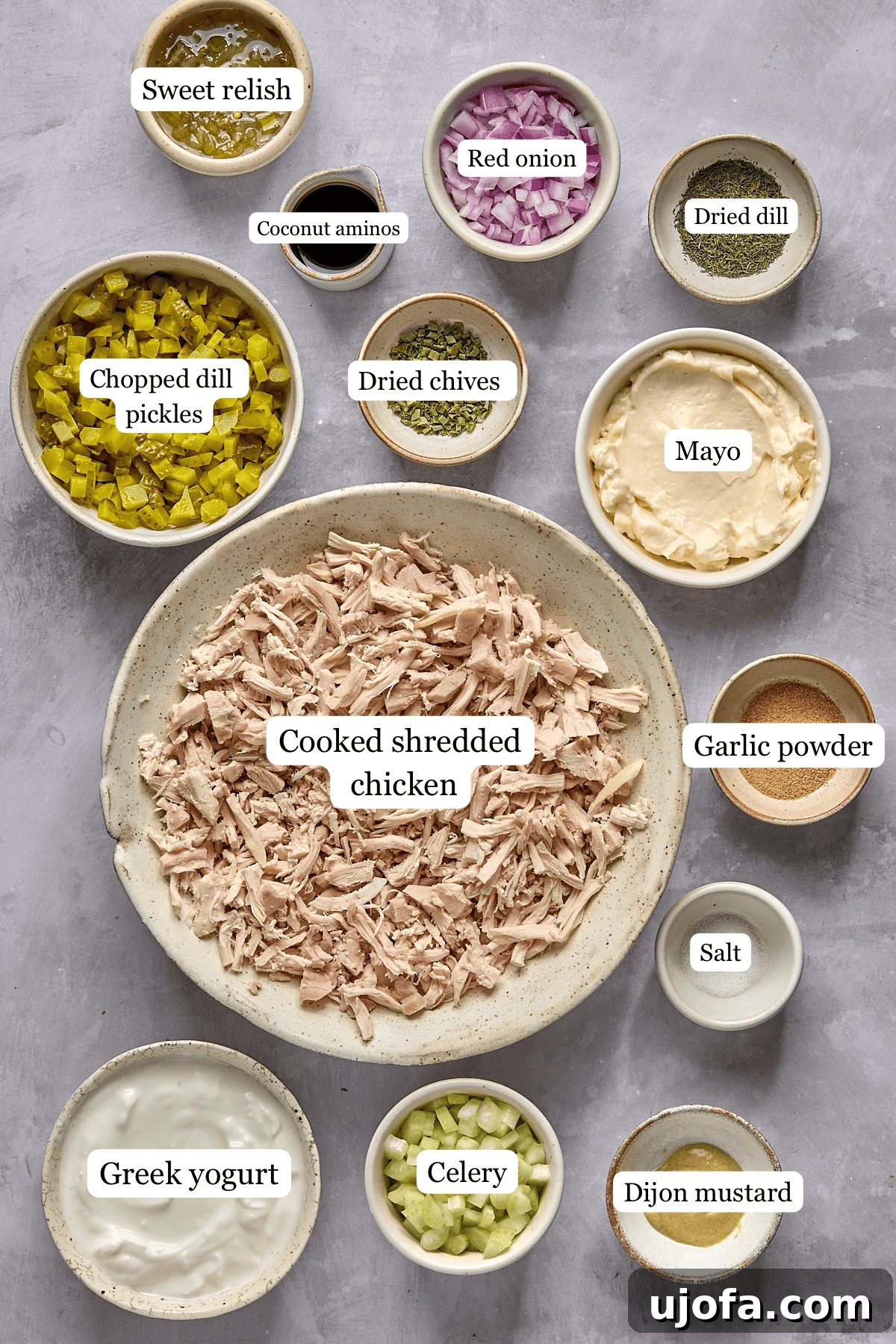 ingredients for pickle chicken salad in nesting bowls