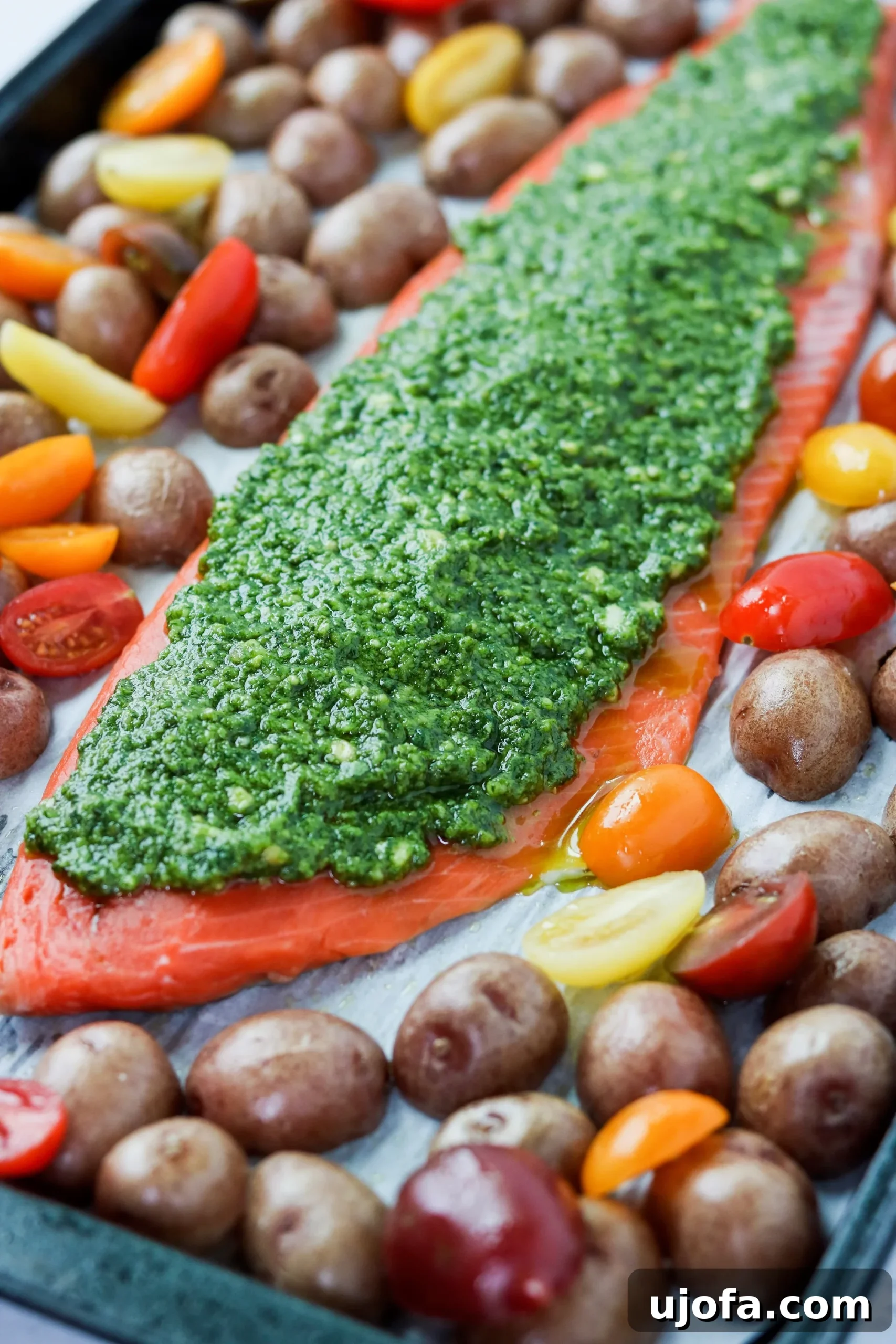 Sheet Pan Pesto Salmon with Potatoes and Tomatoes
