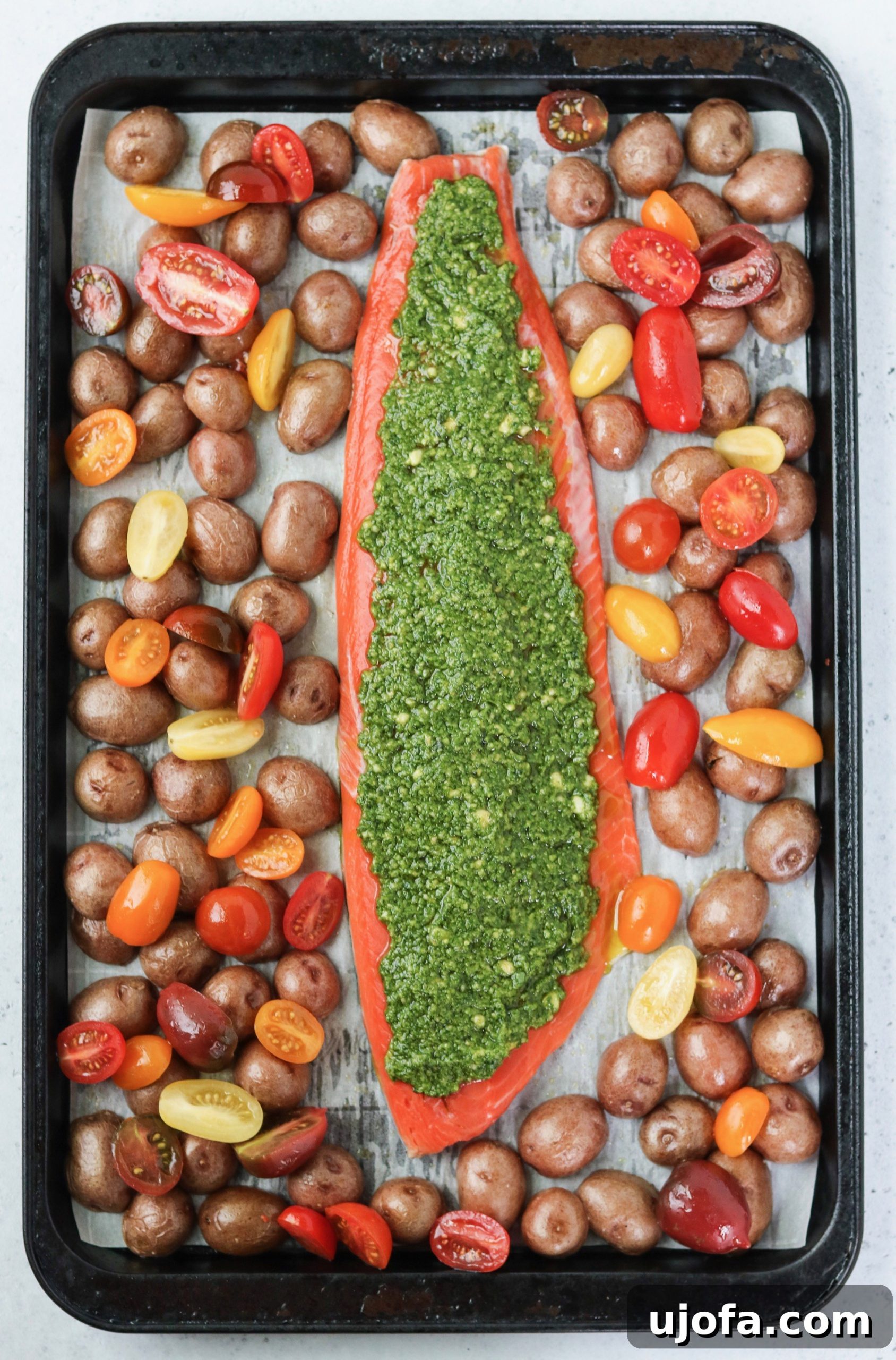 Close-up of baked salmon with pesto