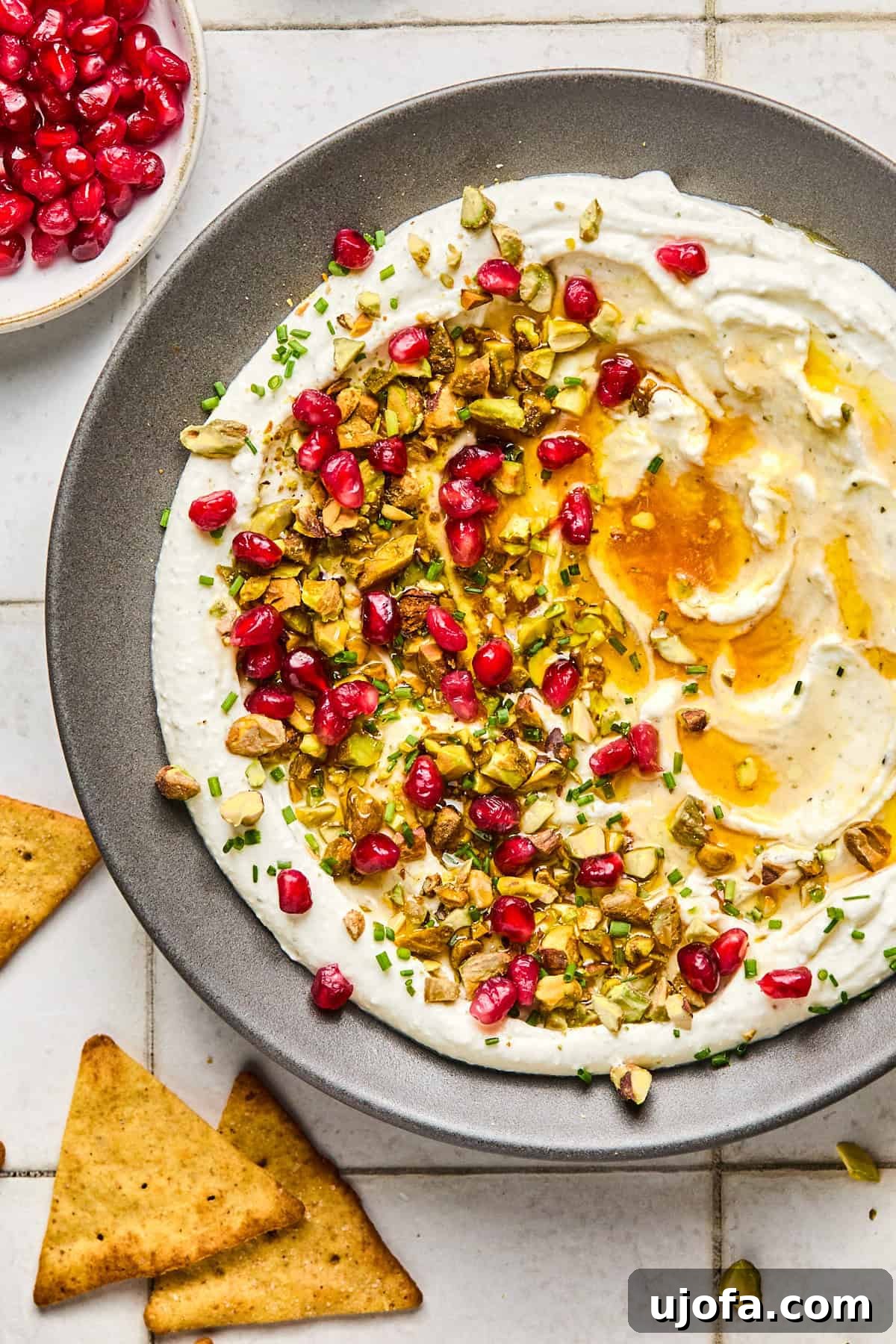 whipped feta on a plate with toppings drizzled with honey