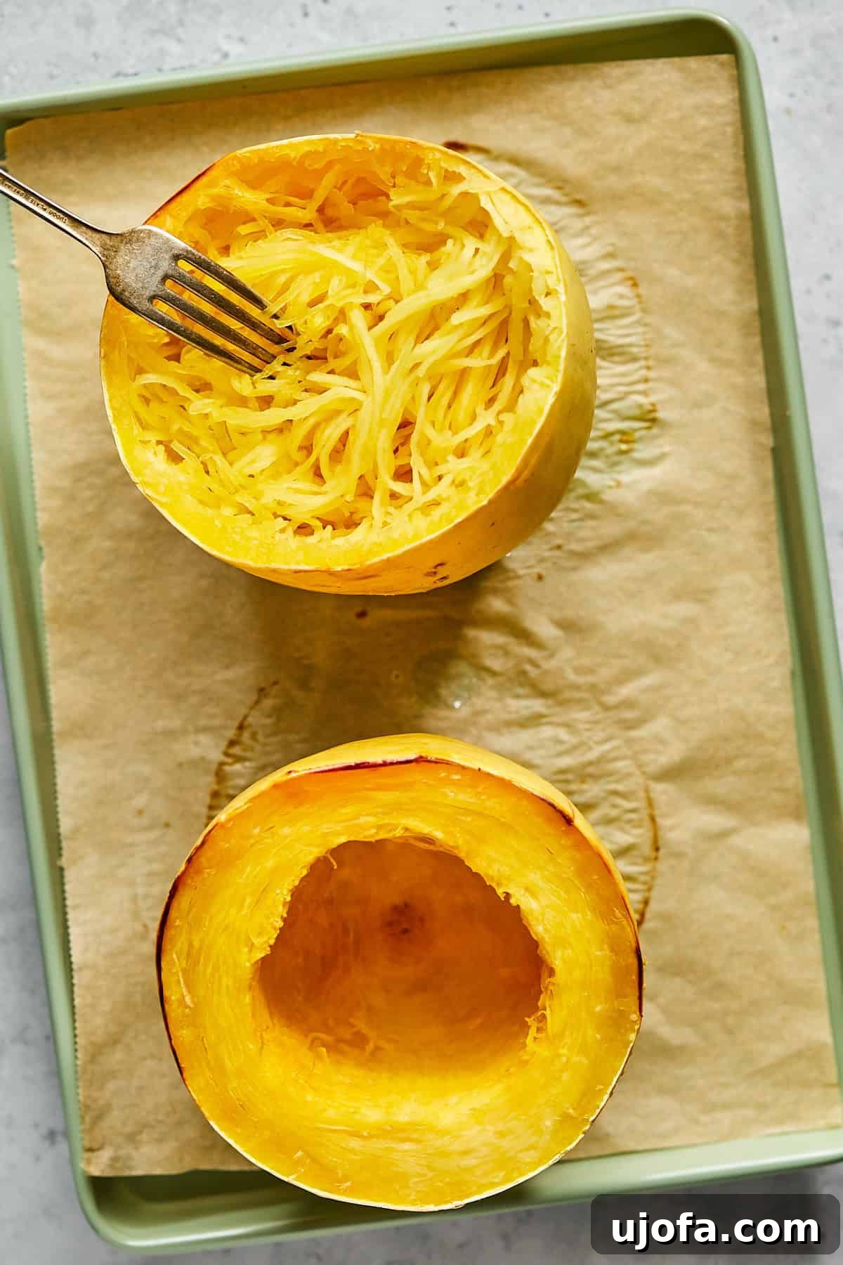Dreamy Boursin Chicken Bake 8 a fork noodling spaghetti squash