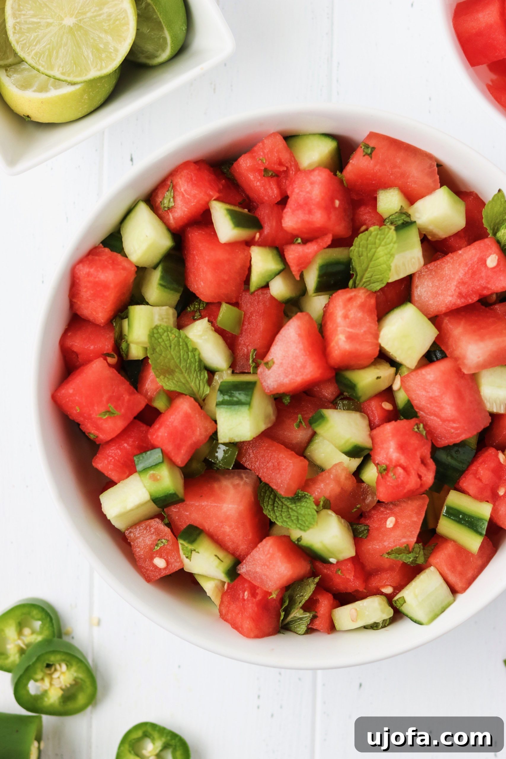 Close-up of Watermelon Cucumber Salad with fresh mint and lime zest, highlighting its colorful ingredients.