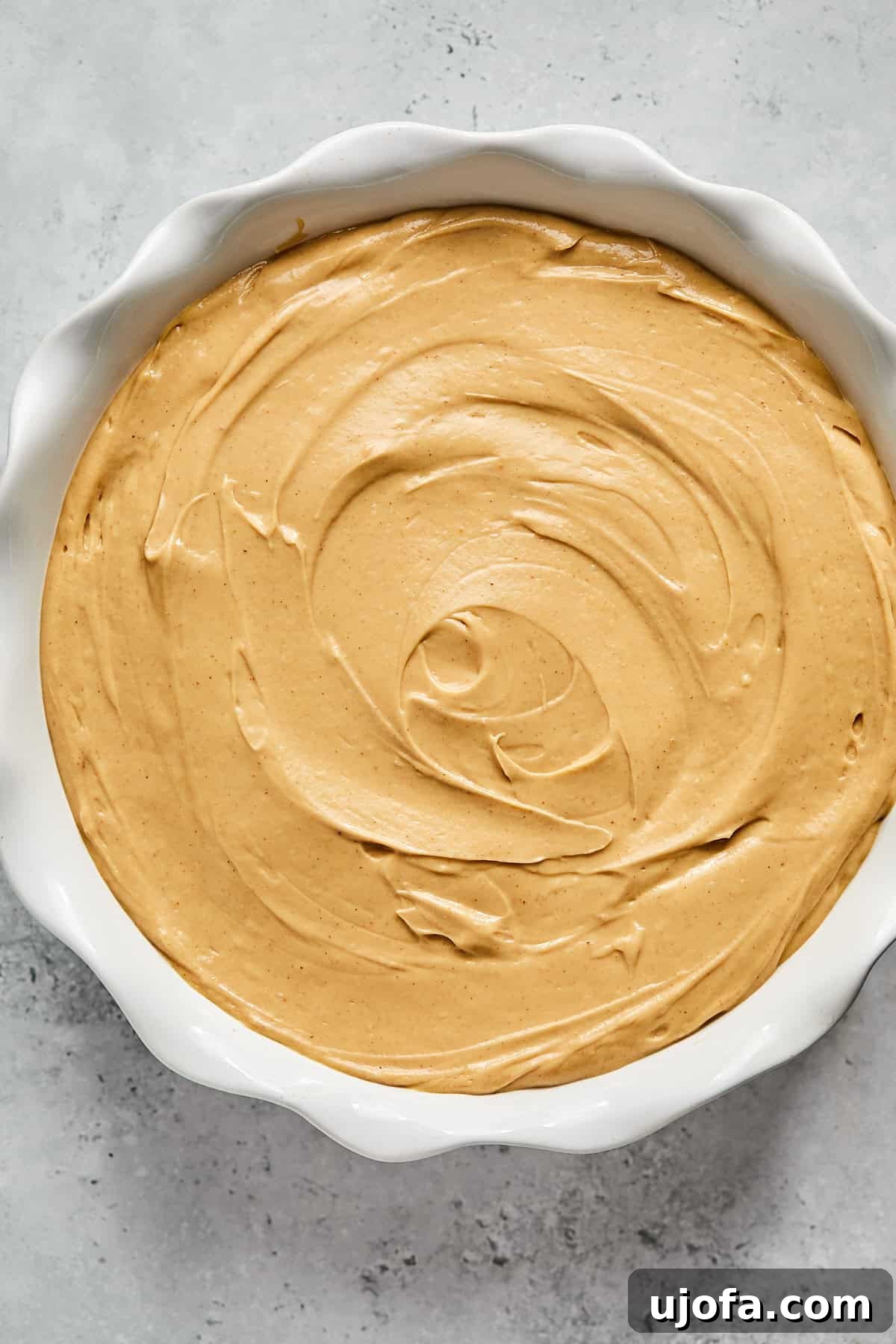 No-Bake Vegan Peanut Butter Bliss 13 A finished dairy-free peanut butter pie, chilled and ready for serving, in a pie pan.